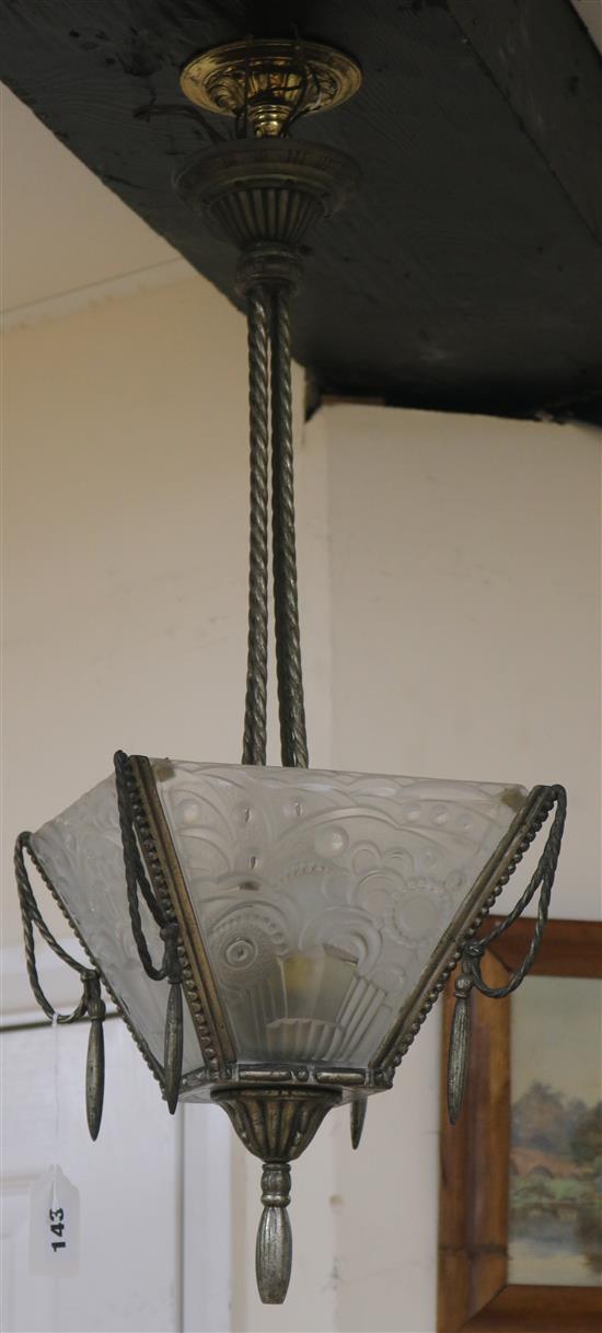 A silvered bronze ceiling light, with moulded shades